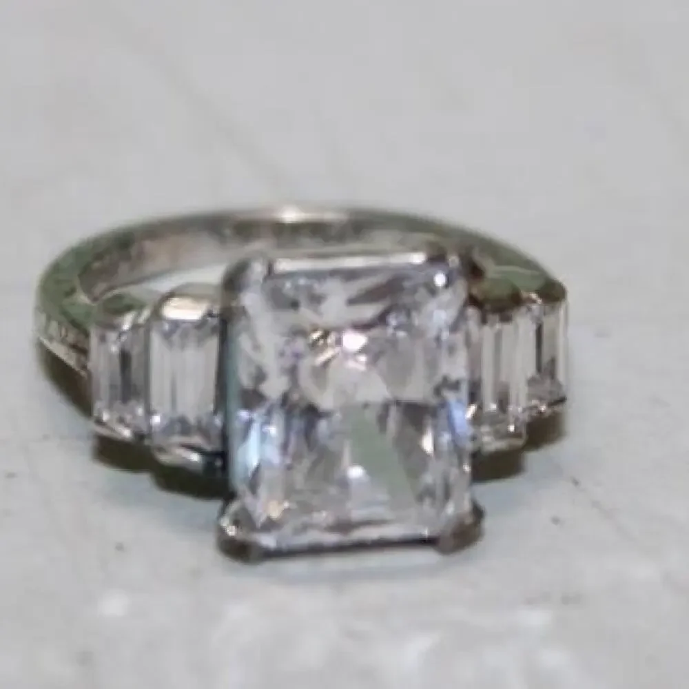 MONET 925 STERLING SILVER AND 10 CARAT COLORLESS GEMS ENGAGEMENT RING